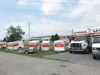 u-haul truck and trailers on lot